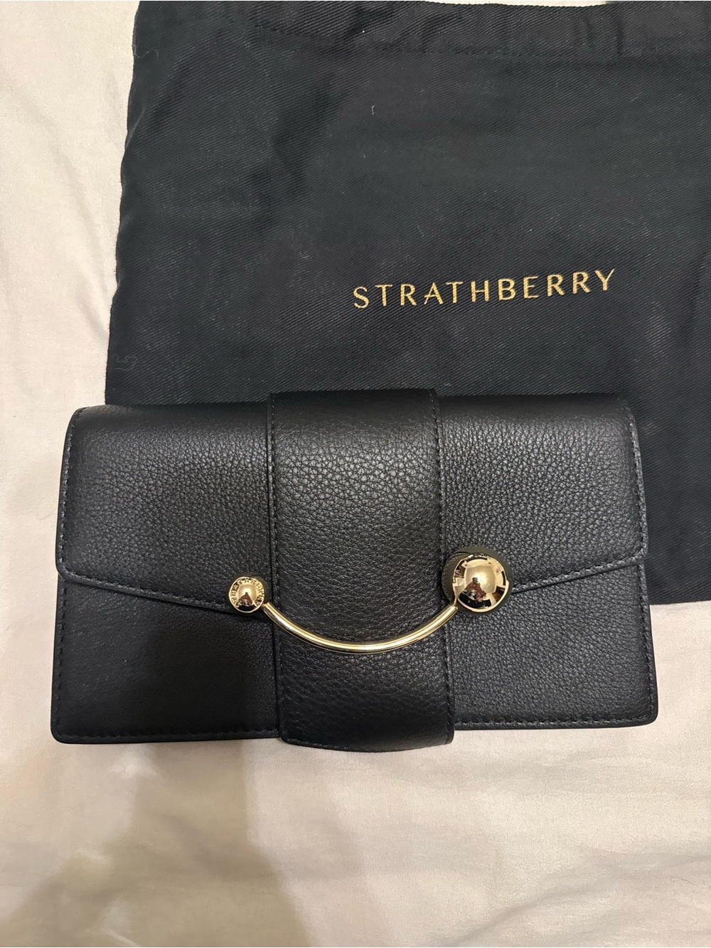 Strathberry Black Leather Wallet on Chain with Gold Arc Hardware